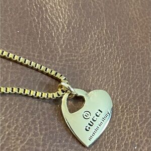 Gucci Gold Heart Charm necklace stamped.